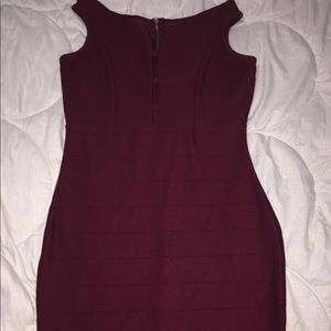 Fitted burgundy dress.